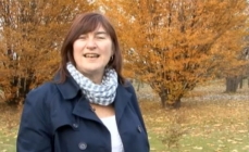 Photo of Céline Arseneault, ccoordinator of the exhibit Trees Inside Out, in the Arboretum of the Jardin botanique de Montréal