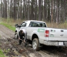 Photo of a truck stuck in the mud 